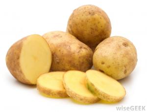 whole-and-sliced-raw-potatoes